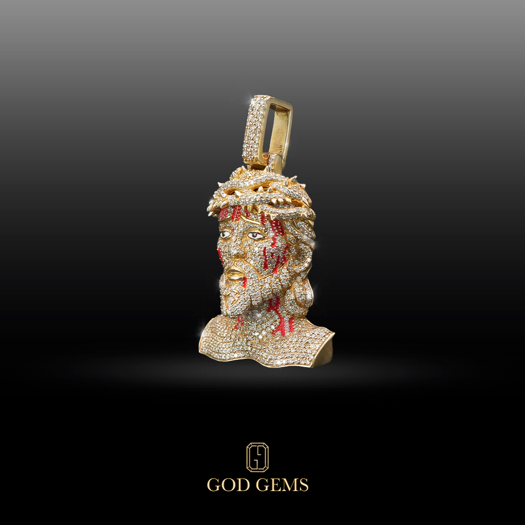 Dije Jesus Piece con Diamantes en Oro 14K.