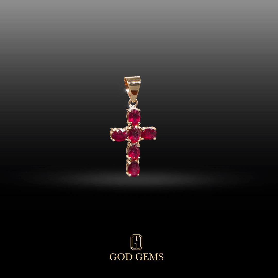 Dije Cruz de Rubíes en Oro 18K.