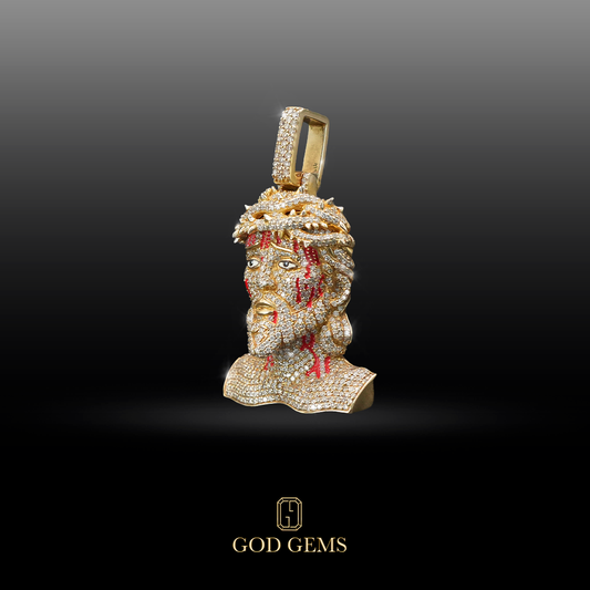 Dije Jesus Piece con Diamantes en Oro 14K.