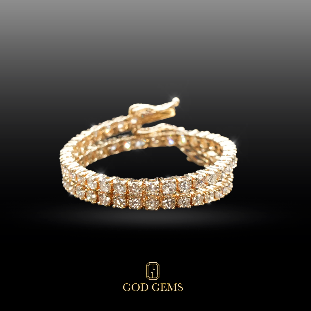 Pulsera Tenis de Diamantes con Montura en Oro de 14K.